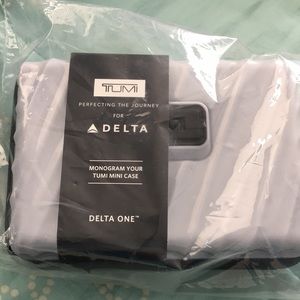 TUMI Hard Case Amenity kit; Delta One